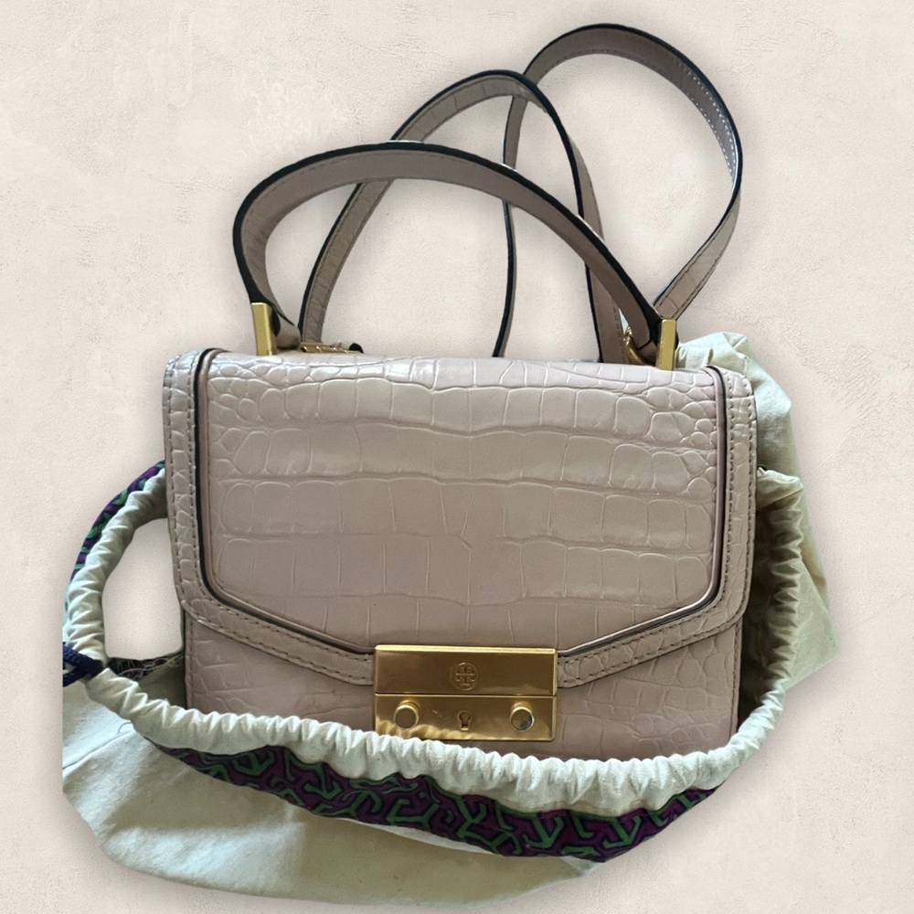 Light pink colored Tory Burch leather embossed crossbody